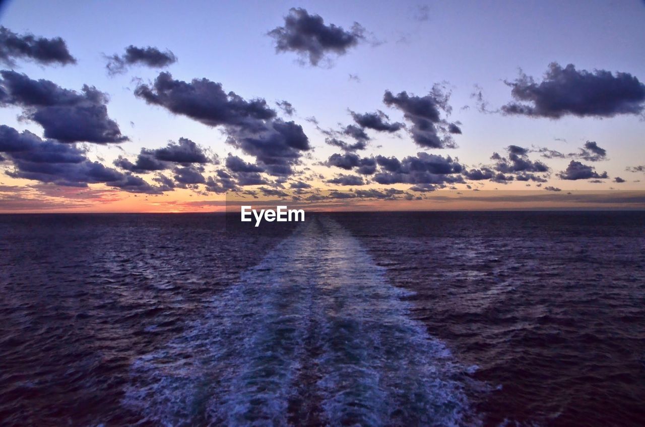 Scenic view of sea at sunset