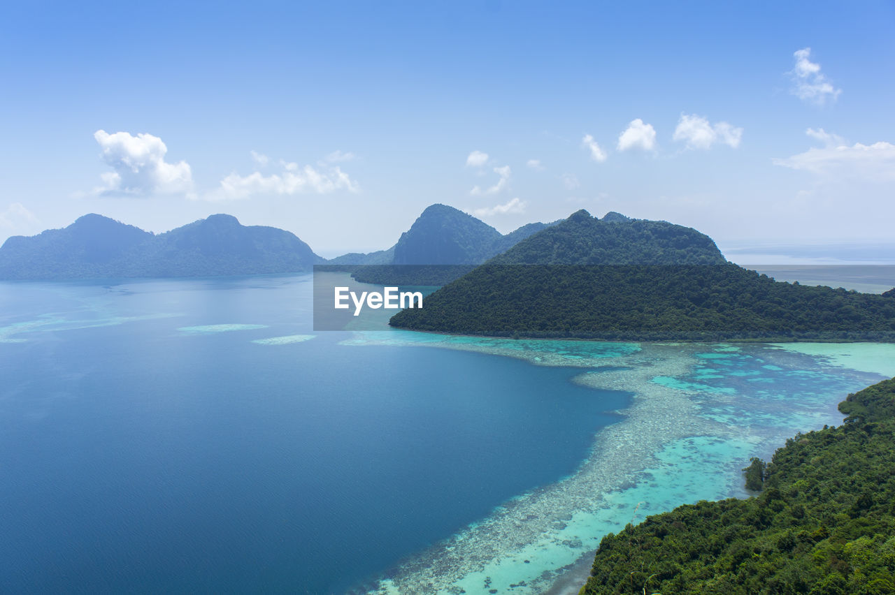 Scenic view of sea against sky at bohey dulang island