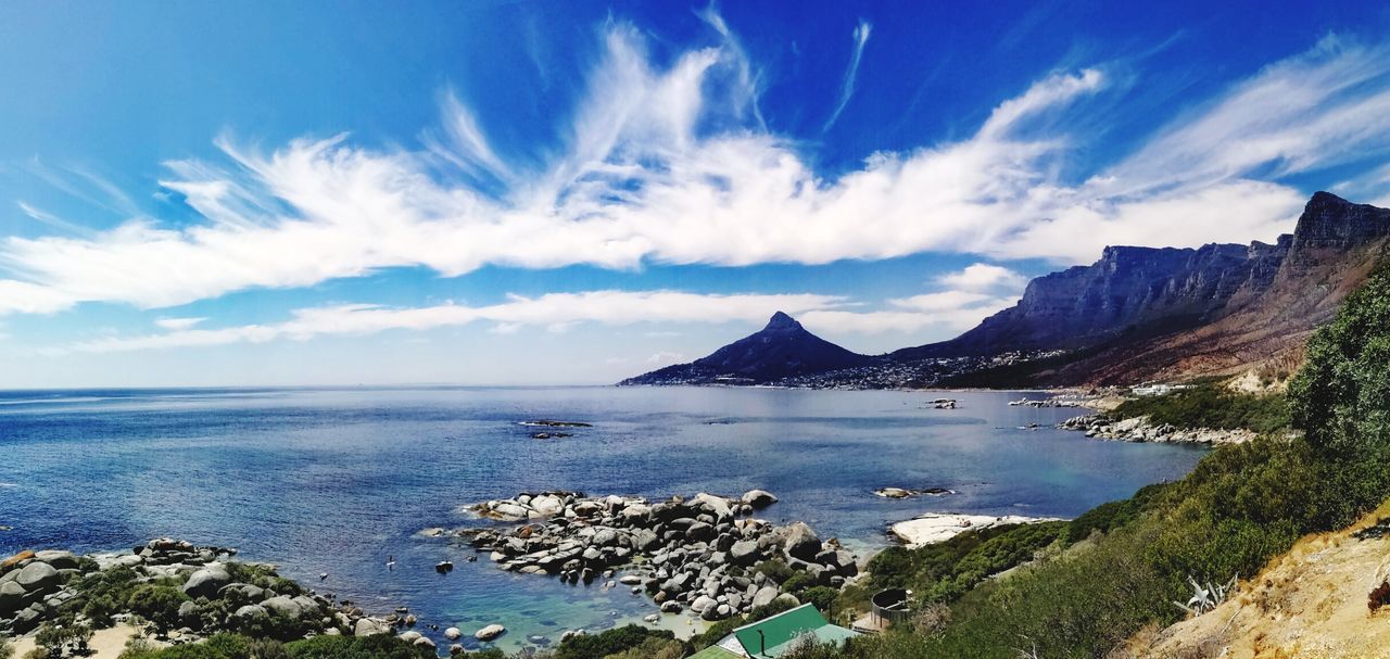 Panoramic view of sea and bay against sky