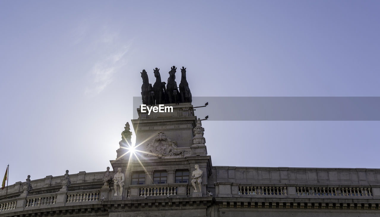 Low angle view of madrid royal palace against sky