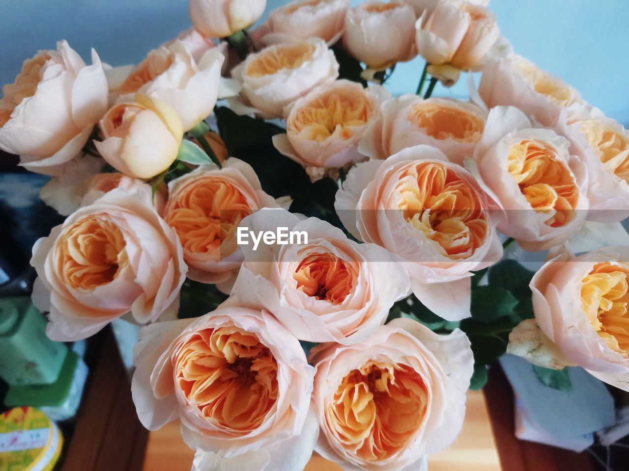 flower, flowering plant, beauty in nature, plant, freshness, bouquet, floristry, rose, flower arrangement, floral design, nature, cut flowers, event, no people, celebration, yellow, flower head, wedding, close-up, fragility, high angle view, food and drink, indoors, garden roses, petal, food, arrangement