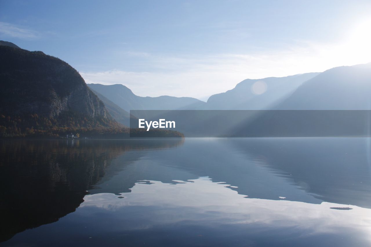 Scenic shot of reflection of mountains in calm lake