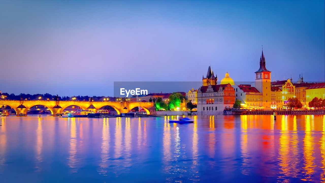 Illuminated buildings at waterfront