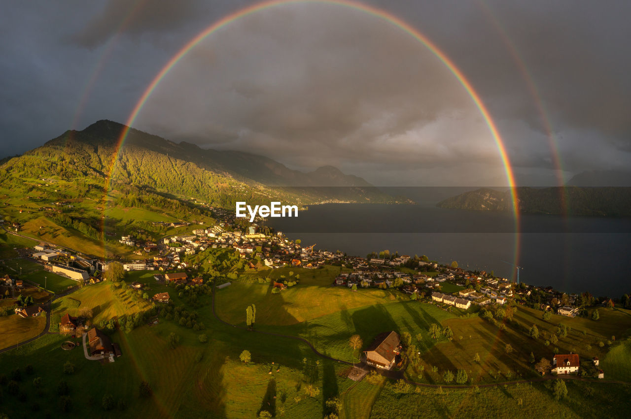 scenic view of rainbow over field