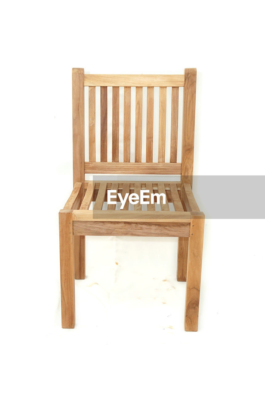 WOODEN CHAIRS AGAINST WHITE BACKGROUND