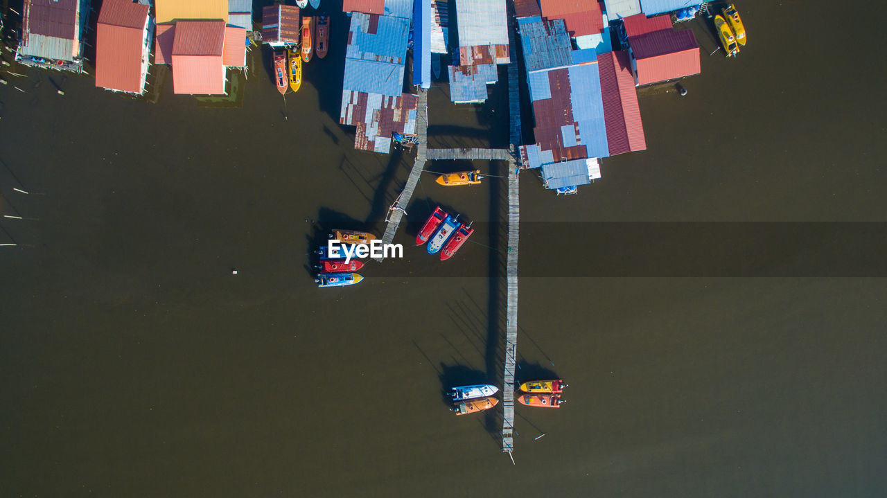 High angle view of houses by harbor