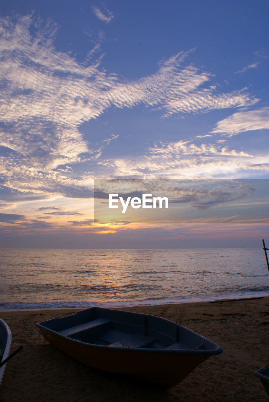 Scenic view of sea against sky at sunset