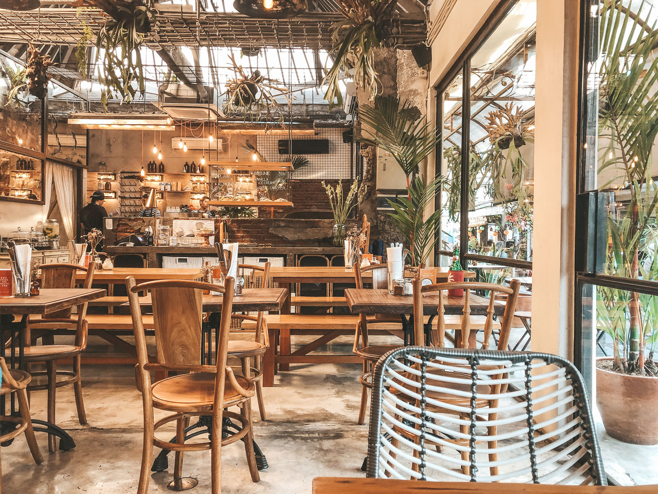 CHAIRS AND TABLES IN RESTAURANT