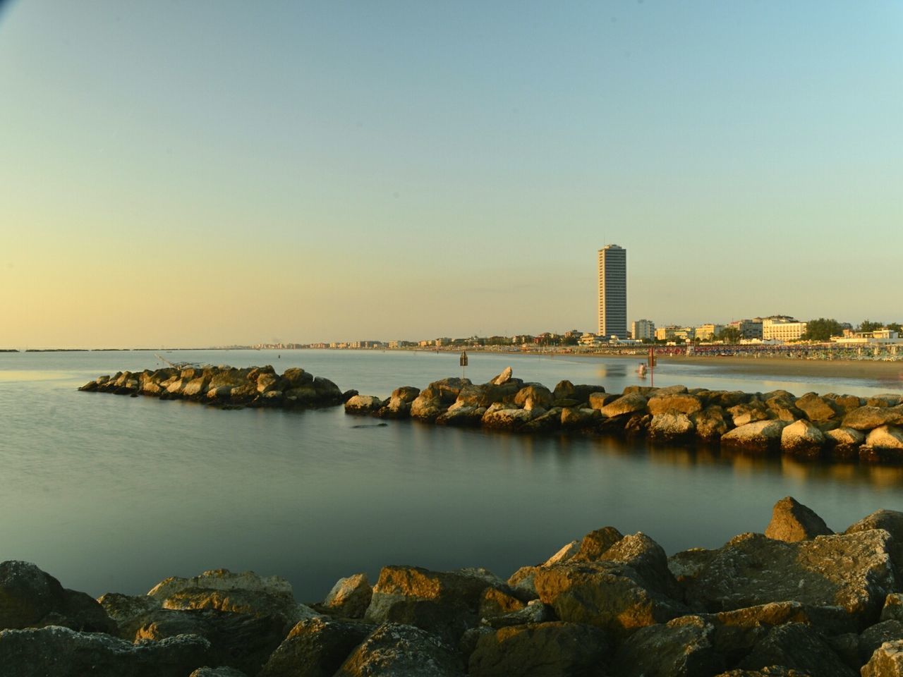 CITY BY SEA AGAINST CLEAR SKY