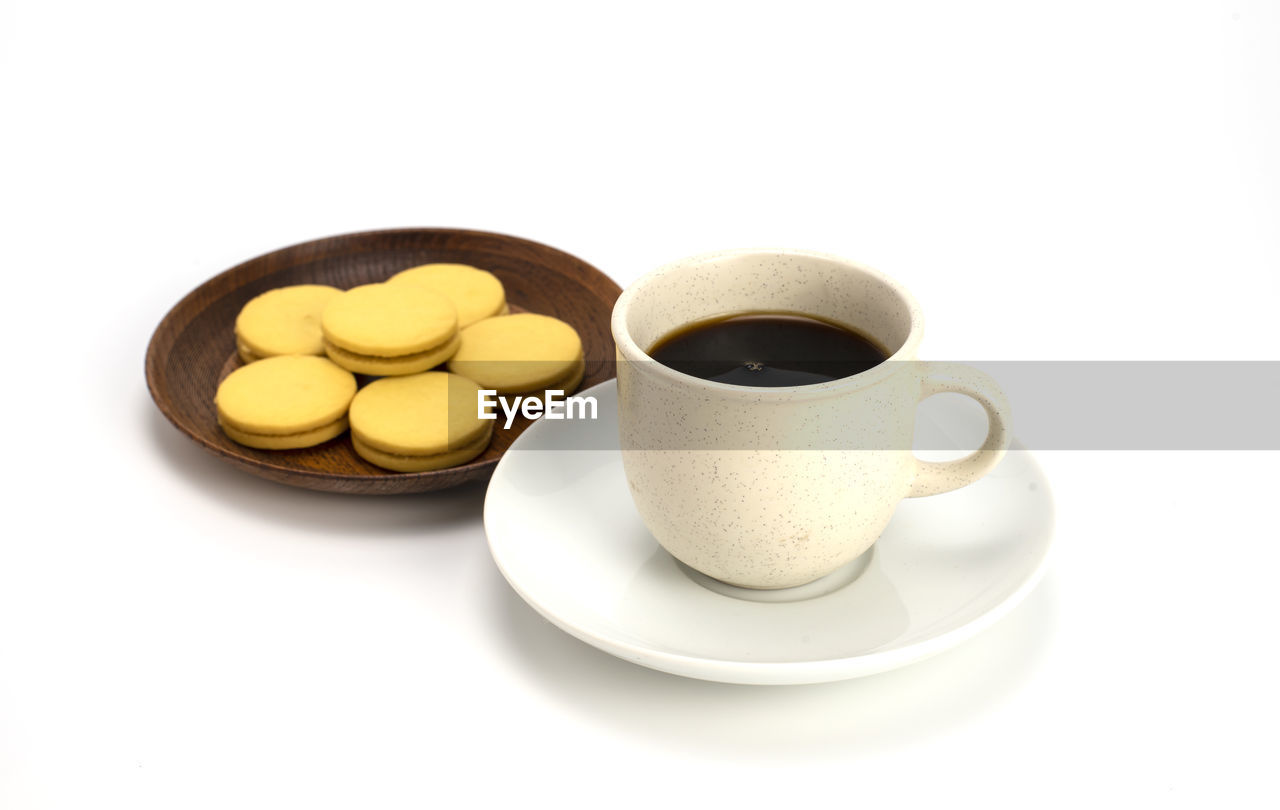 food and drink, cup, coffee cup, mug, drink, white background, food, refreshment, cut out, coffee, saucer, crockery, freshness, tea, studio shot, hot drink, indoors, tableware, medicine, white, no people, sweet food, cookie, still life