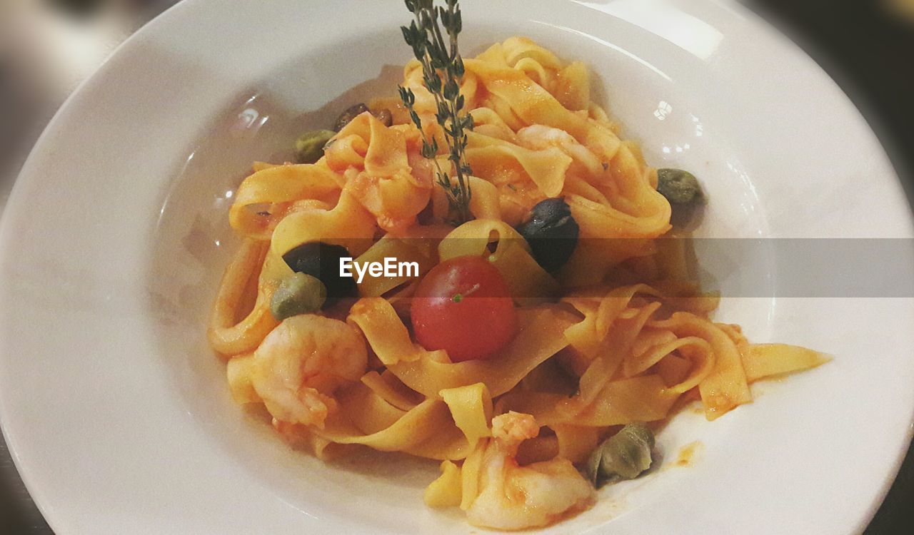 CLOSE-UP OF SERVED NOODLES IN PLATE