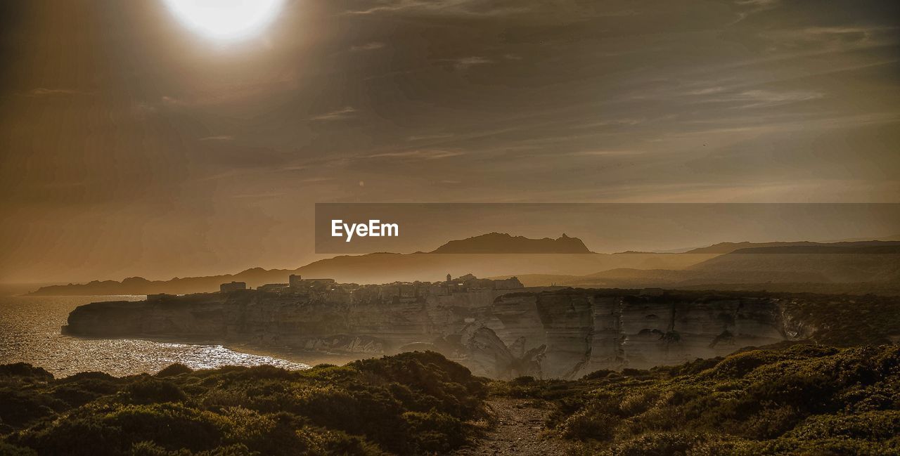 Scenic view of mountains against sky during sunset