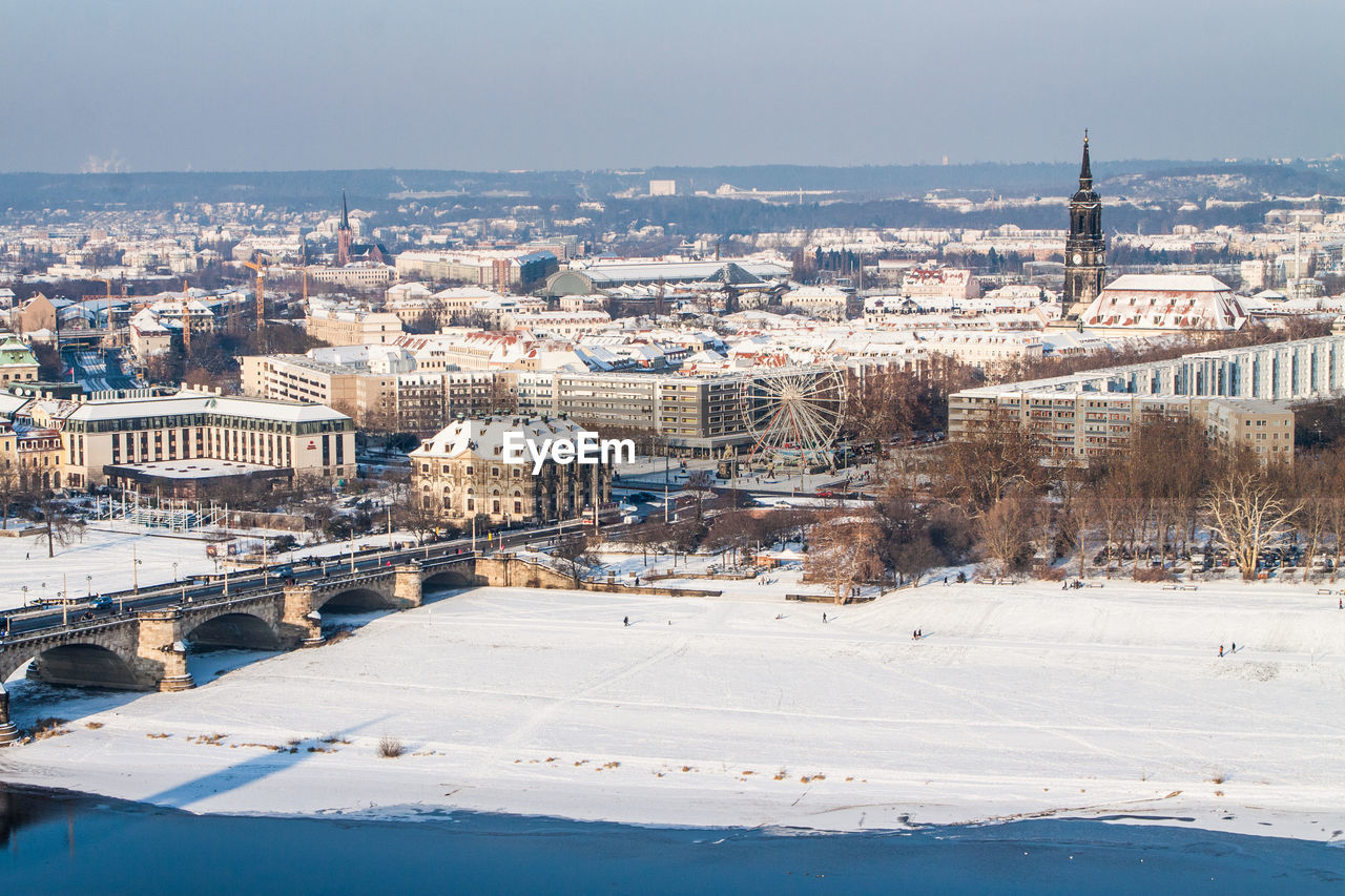 High angle view of cityscape by elbe river during winter
