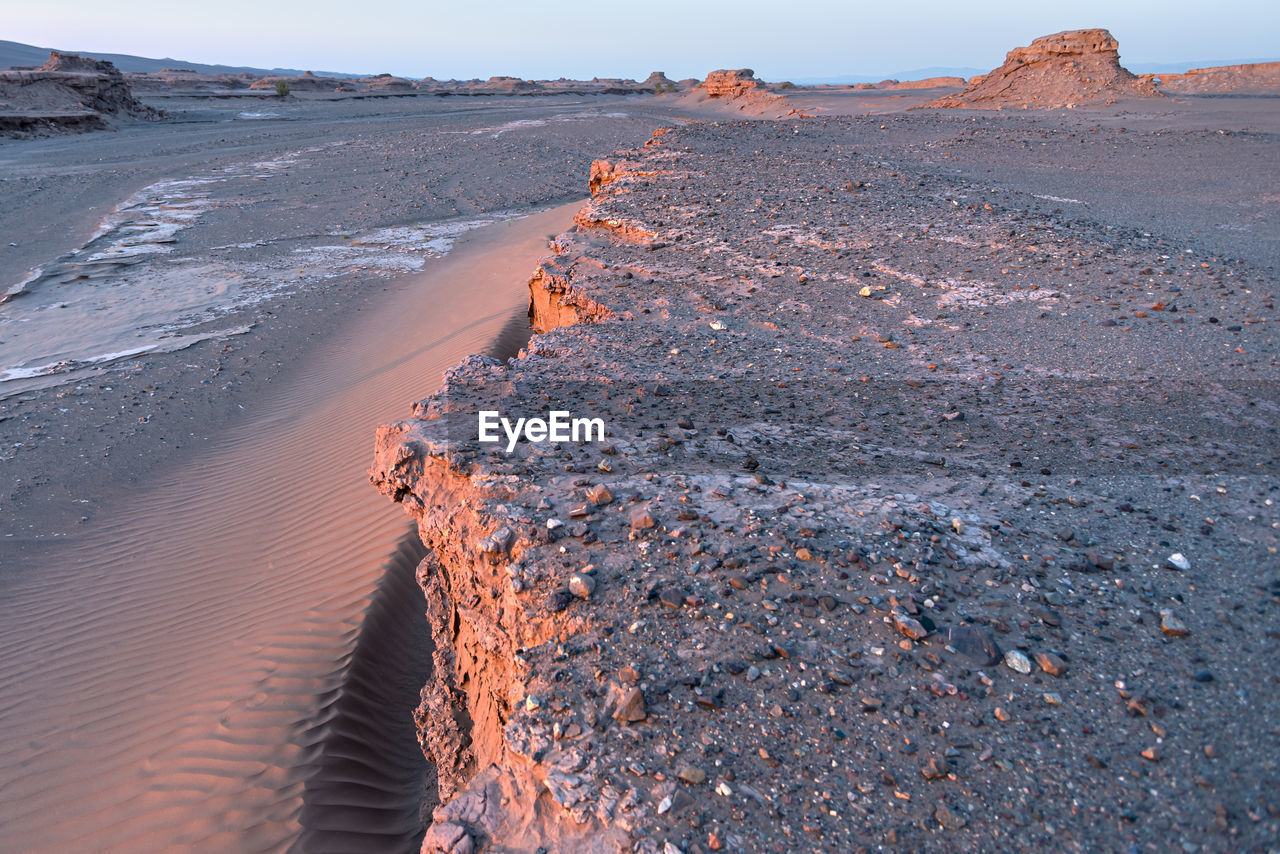 The formation of kaluts or sand stones or yardang in dasht e lut or sahara desert, iran. 