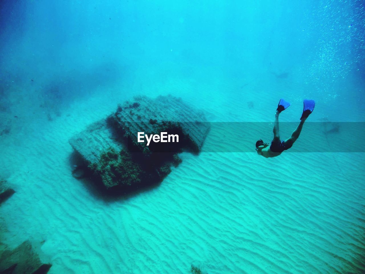 Man swimming in sea
