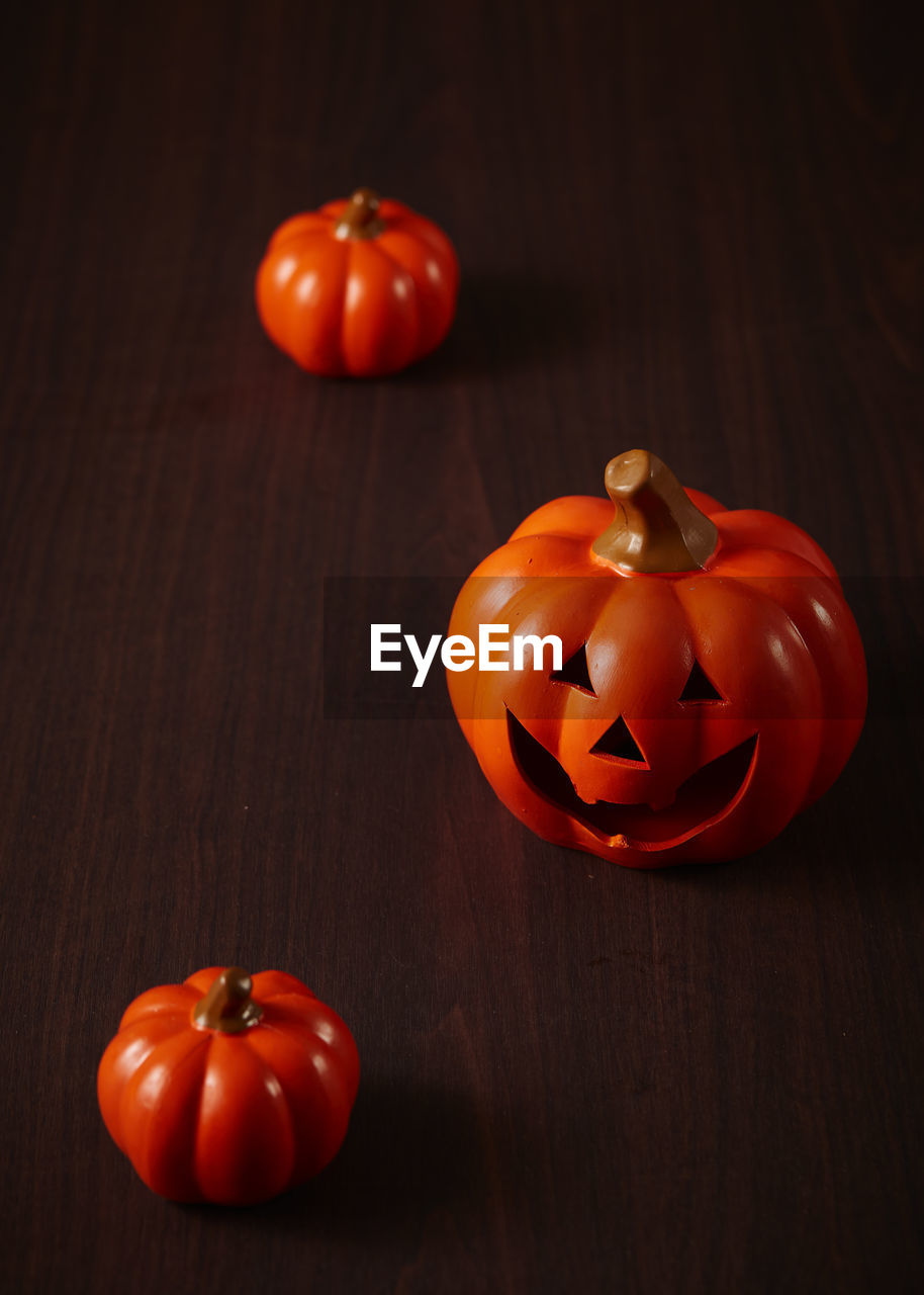 Halloween pumpkin on old wooden background