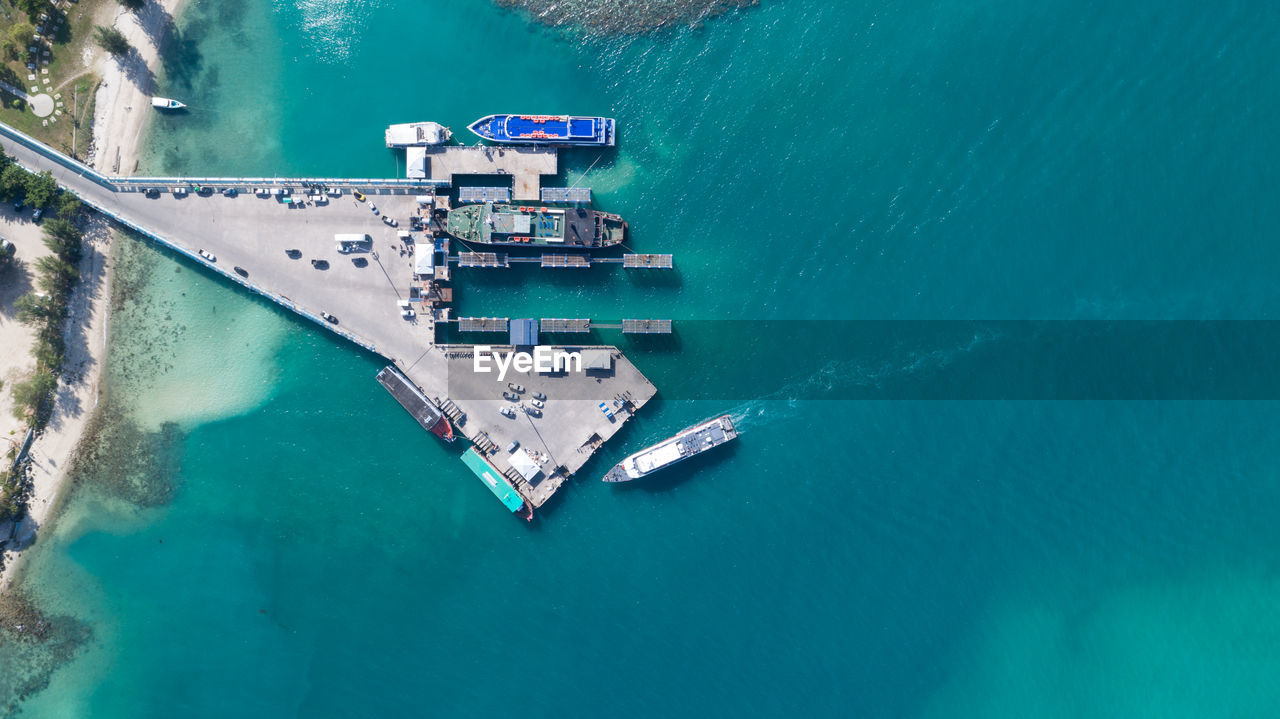 High angle view of ship sailing on sea