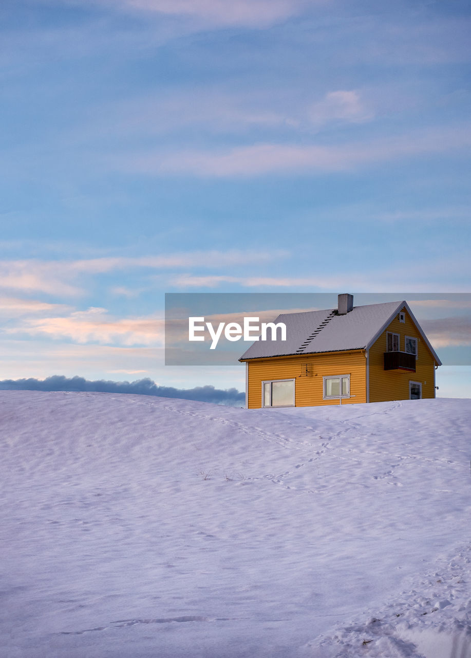 Lonely house on godøy in winter, sunnmøre, møre og romsdal, norway.