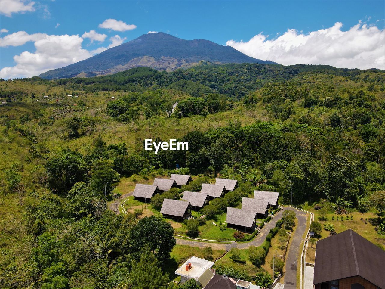 High angle view of trees and mountains against sky