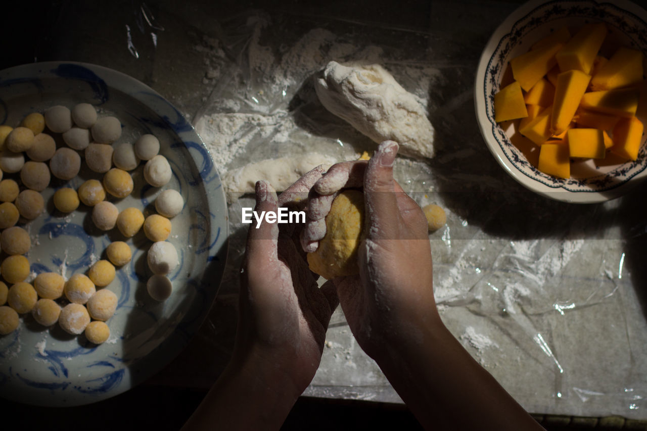 Low section of woman preparing food at home