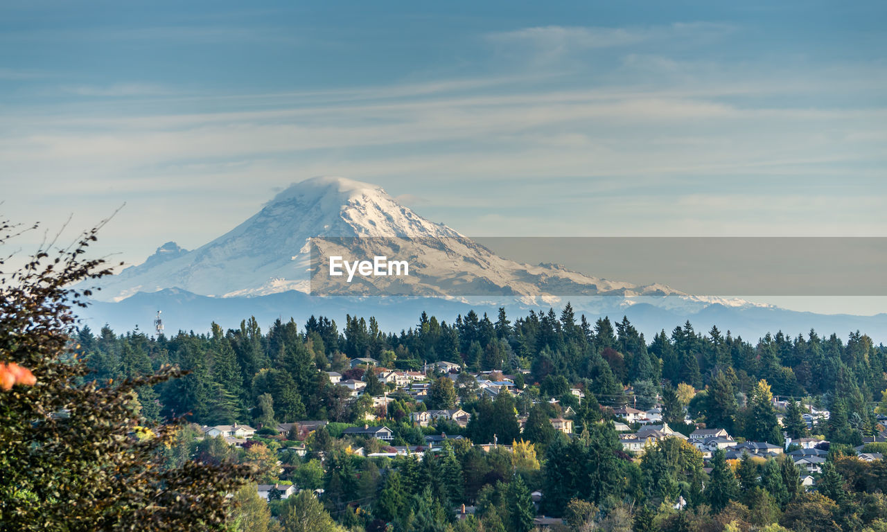A landscape view of mount rainier from burien, washington in the fall.