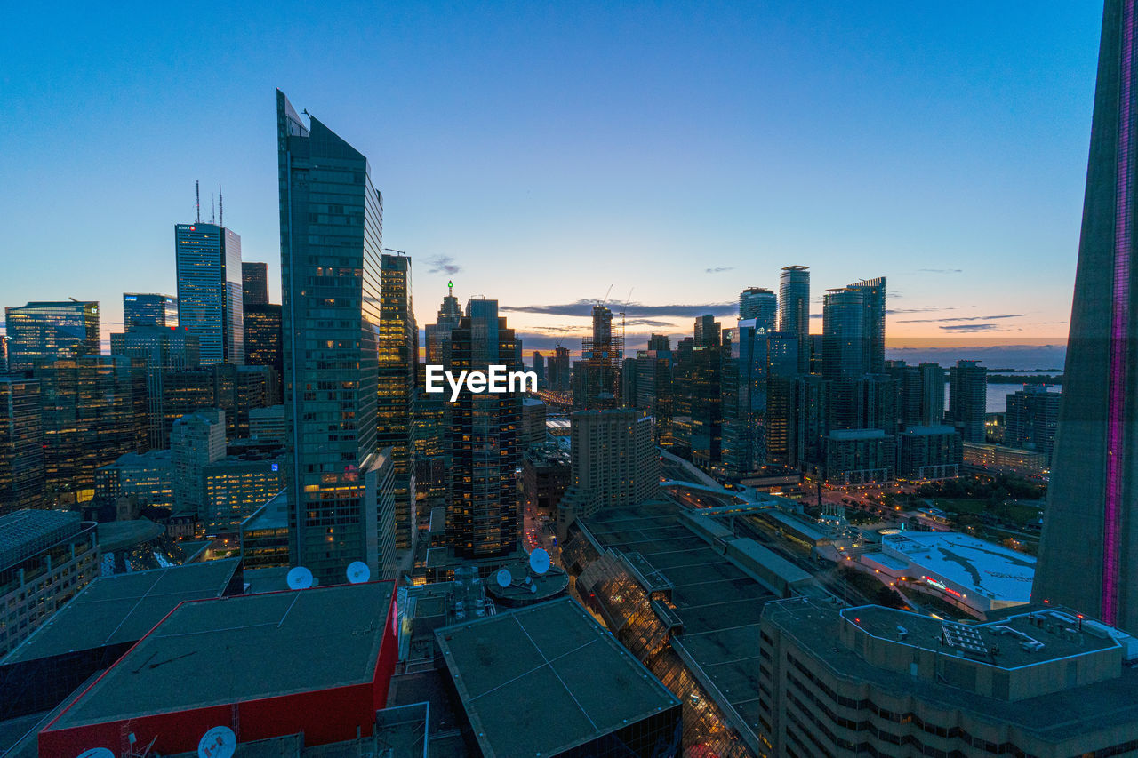 High angle view of buildings against sky during sunset