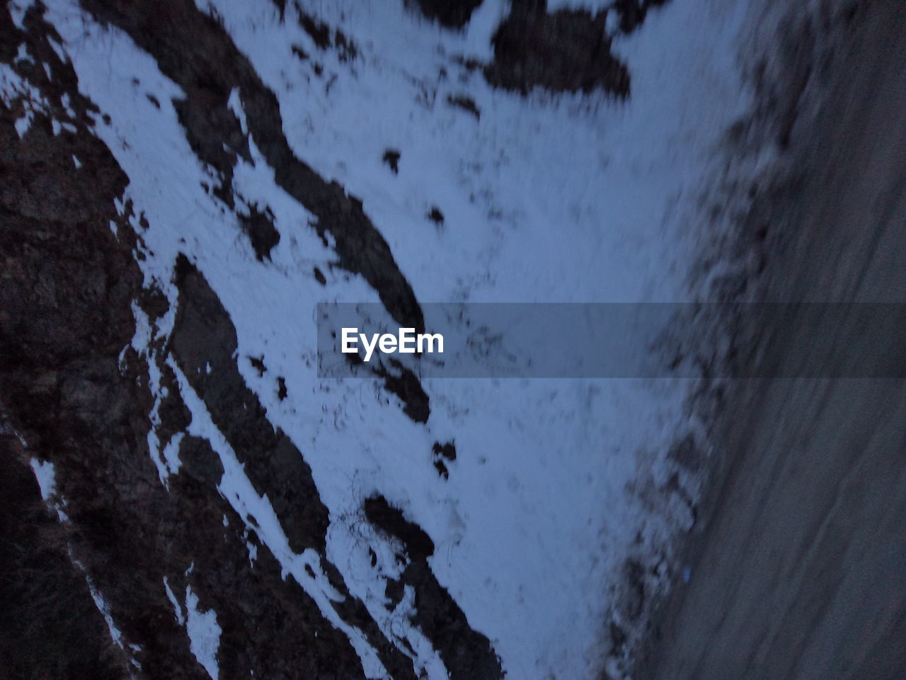 AERIAL VIEW OF SNOW AGAINST SKY