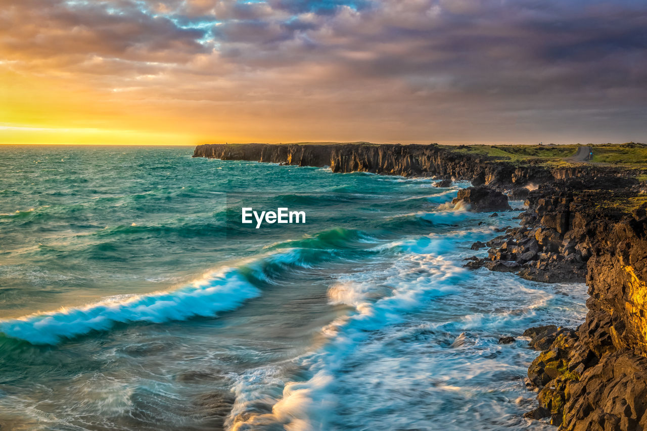 Scenic view of sea against sky during sunset