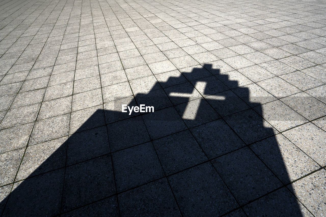 Shadow of a church on the ground