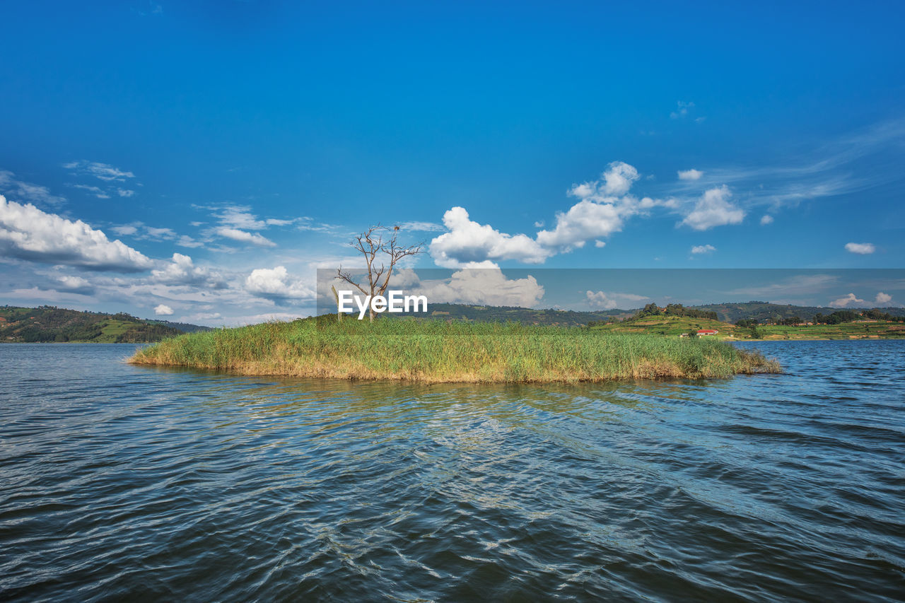 SCENIC VIEW OF LAKE AGAINST CLEAR SKY