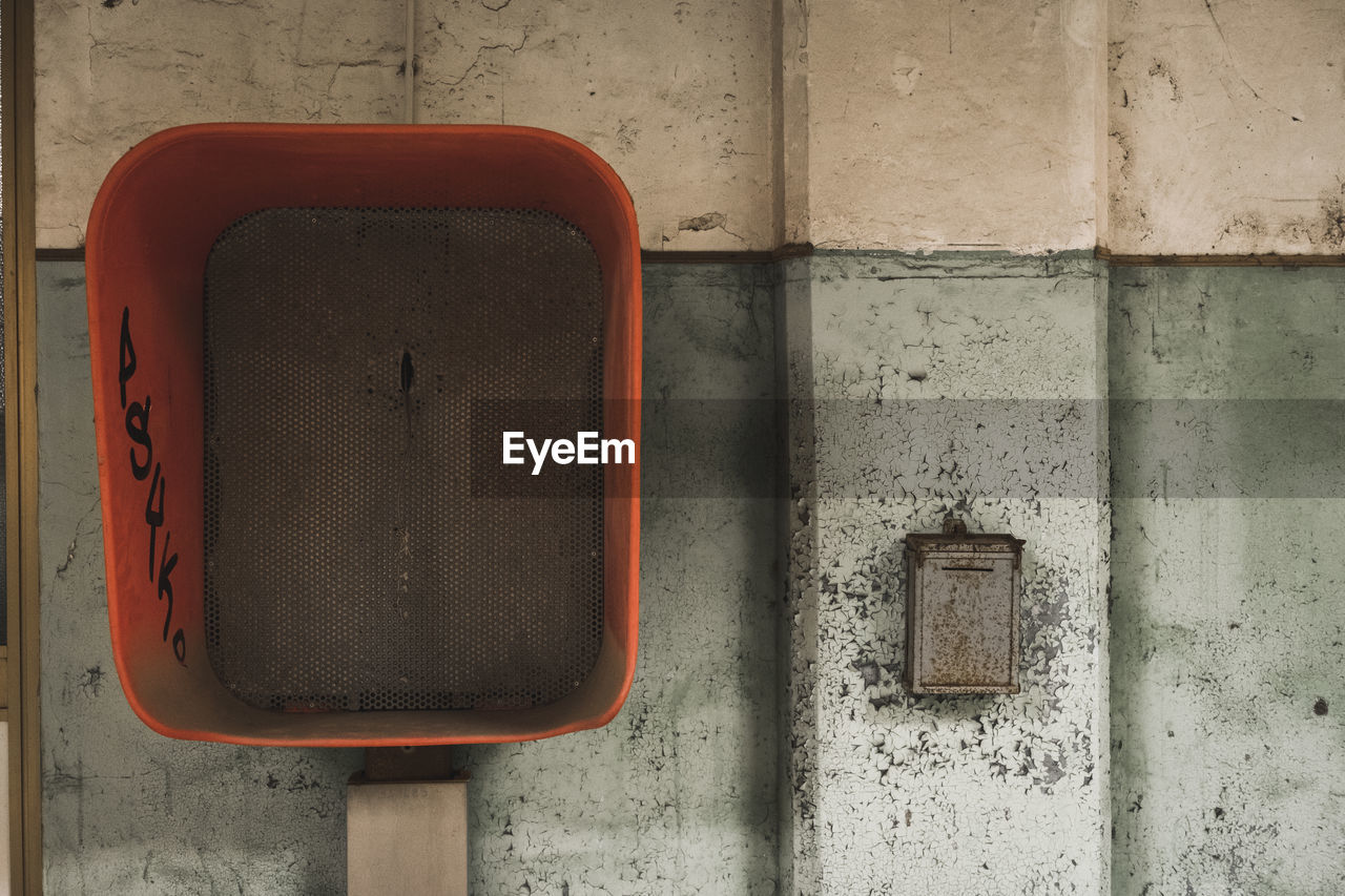 CLOSE-UP OF OLD TELEPHONE BOOTH