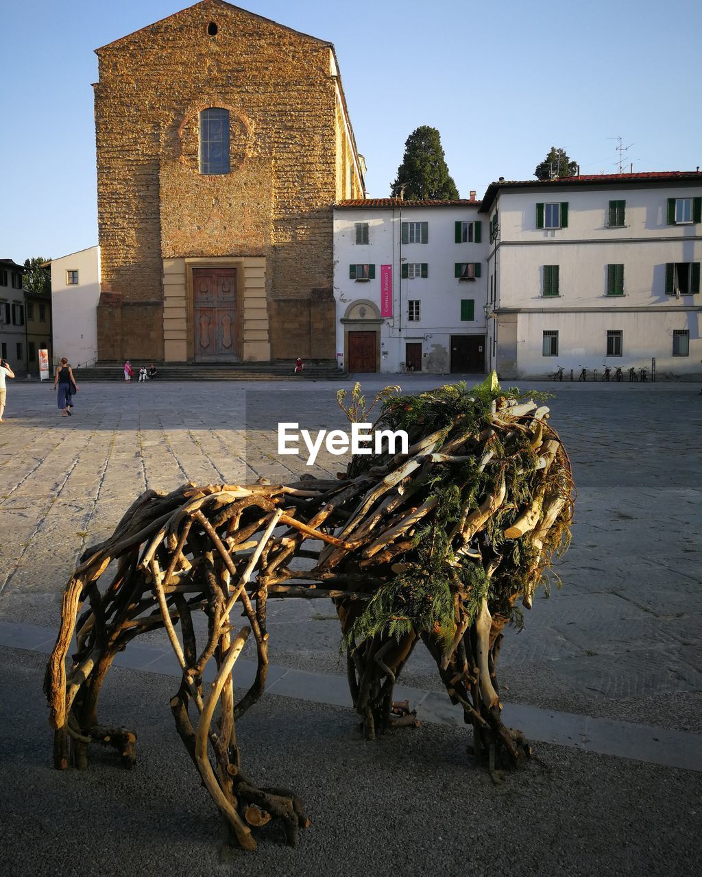 HORSE CART ON STREET BY BUILDINGS