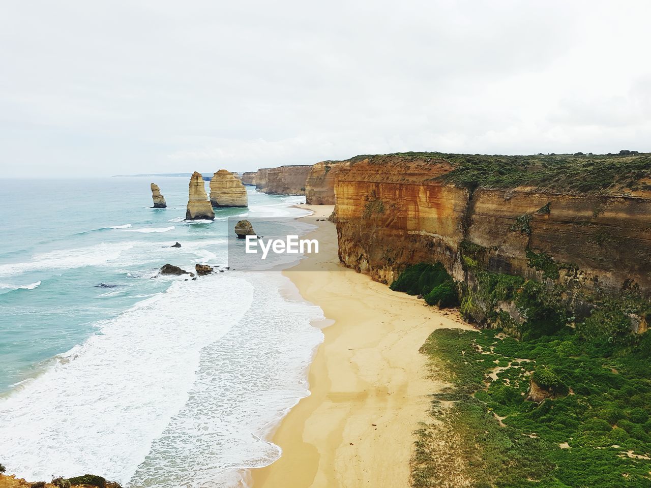 Scenic view of beach against sky