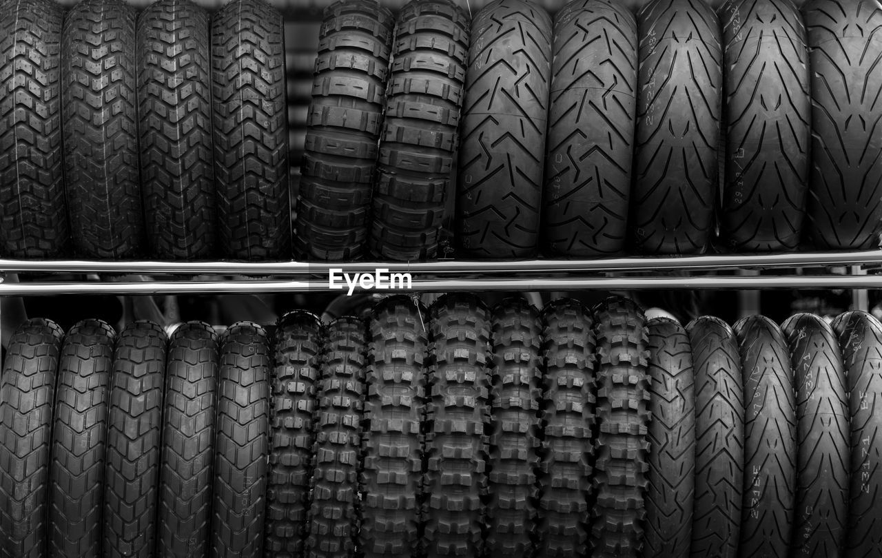 Full frame shot of tires on rack at store