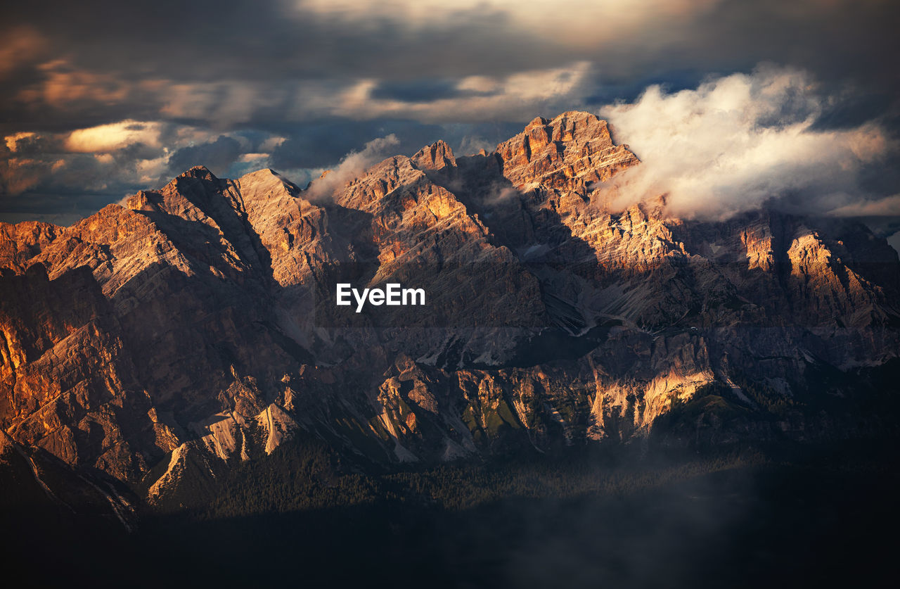 Scenic view of rocky mountains against sky