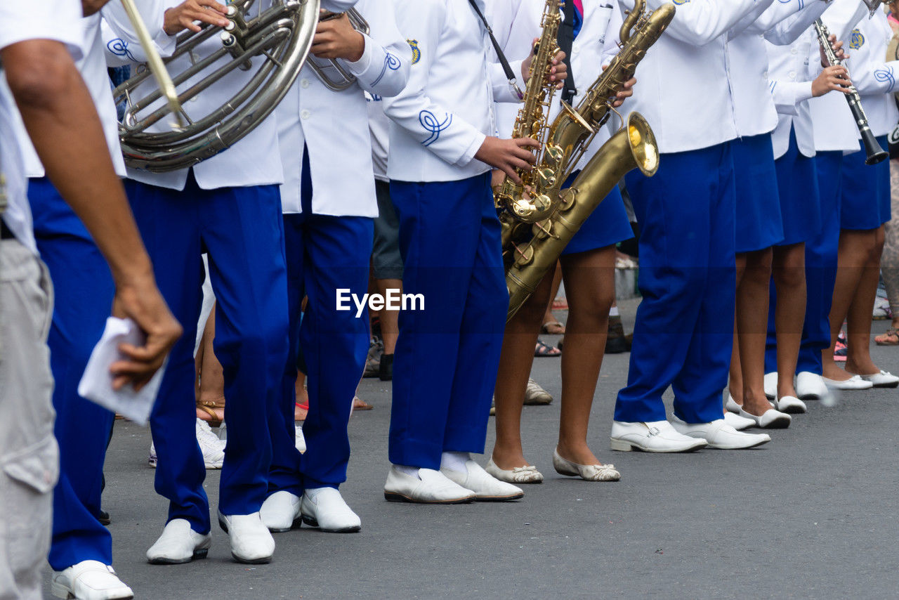 Public school students are seen playing musical instruments during bahia's independence day parade 