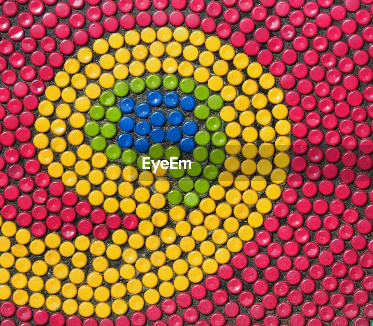 Close-up of multi colored beads on flooring