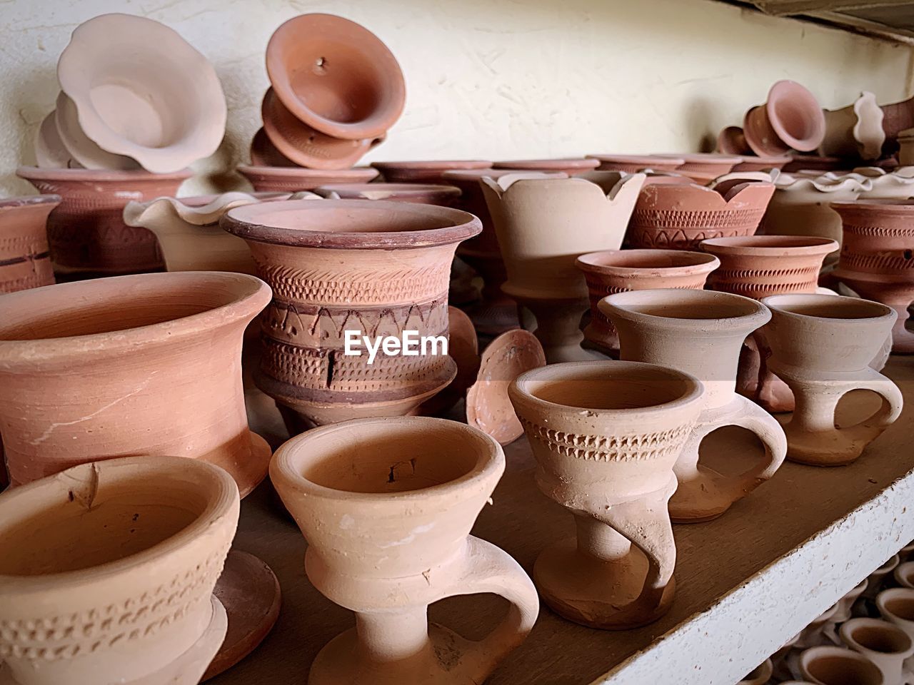 Close-up of earthenware for sale