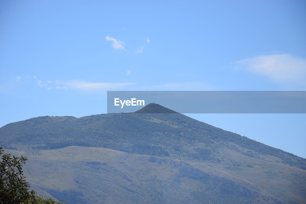 SCENIC VIEW OF MOUNTAIN AGAINST SKY