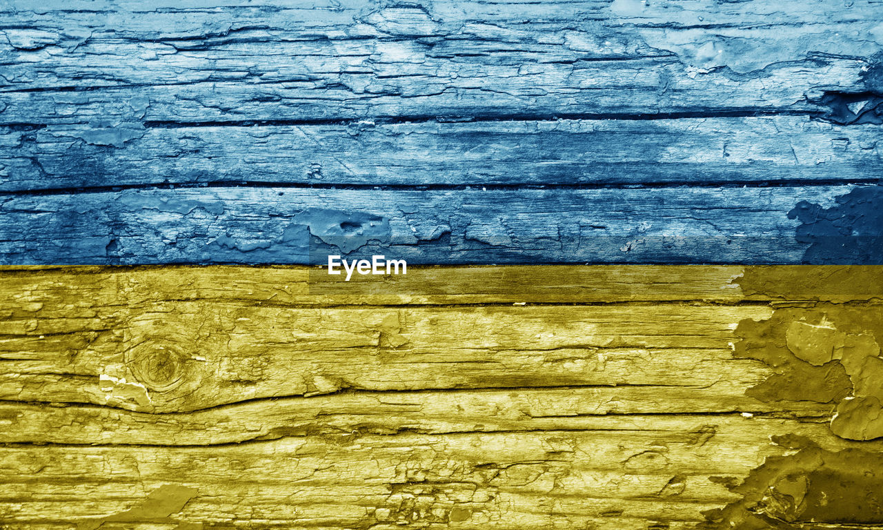 backgrounds, textured, wood, full frame, yellow, pattern, no people, close-up, plank, rough, weathered, old, wall - building feature, blue, wall, day, architecture, built structure, outdoors, paint, damaged, abstract