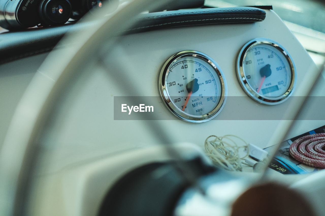 CLOSE-UP OF VINTAGE CAR ON WINDOW