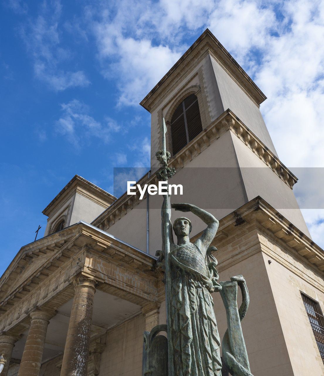 architecture, built structure, building exterior, sky, landmark, low angle view, place of worship, cloud, building, nature, facade, travel destinations, history, no people, the past, monument, religion, day, city, blue, travel, steeple, tower, outdoors, sculpture, belief, tourism, statue, architectural column