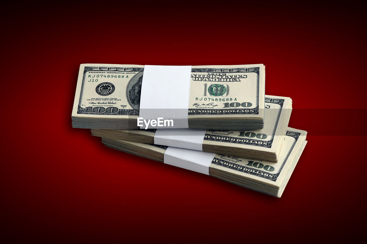 paper currency, currency, finance, cash, business, wealth, text, colored background, red, money, studio shot, red background, document, indoors, dollar, no people, copy space