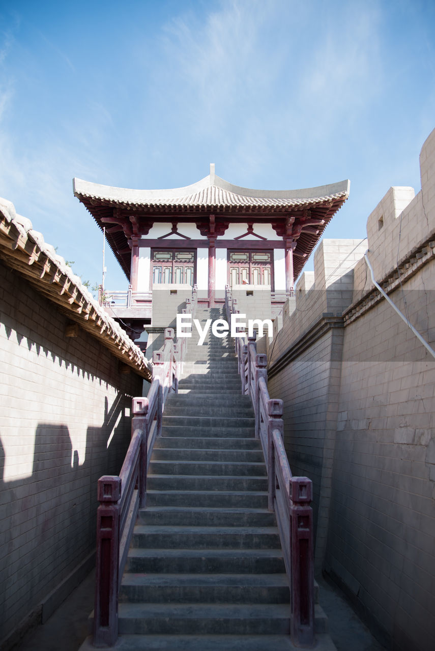 LOW ANGLE VIEW OF STEPS LEADING TOWARDS BUILDING