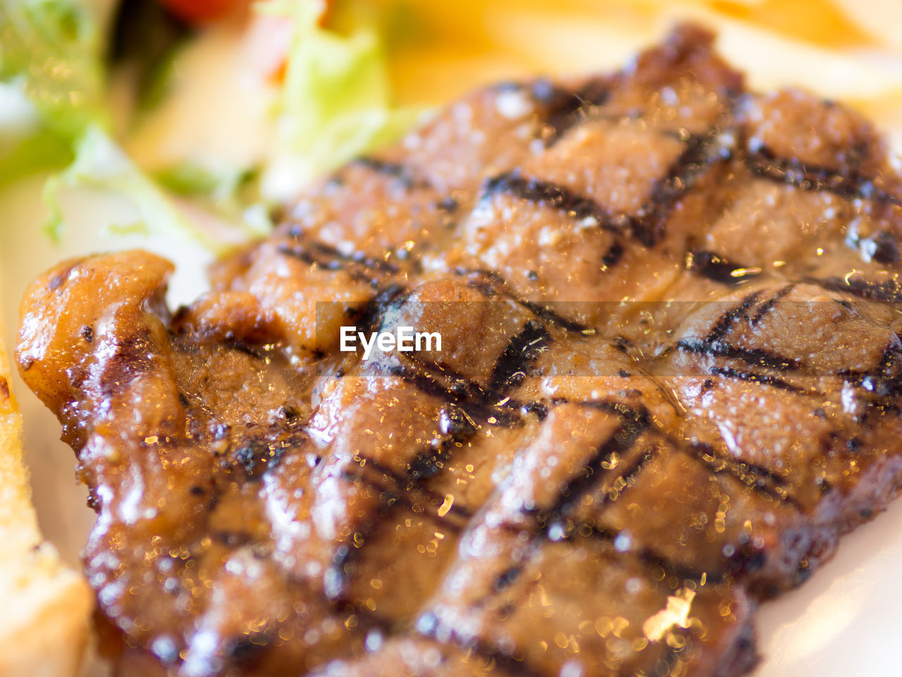 CLOSE-UP OF MEAT SERVED IN PLATE