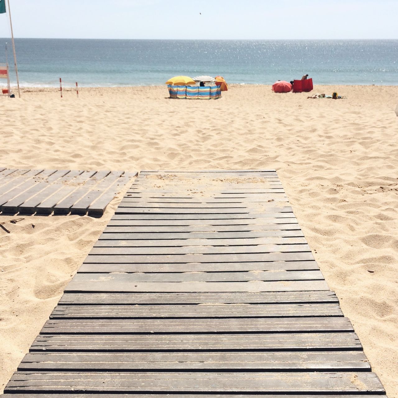 Wooden plank on beach