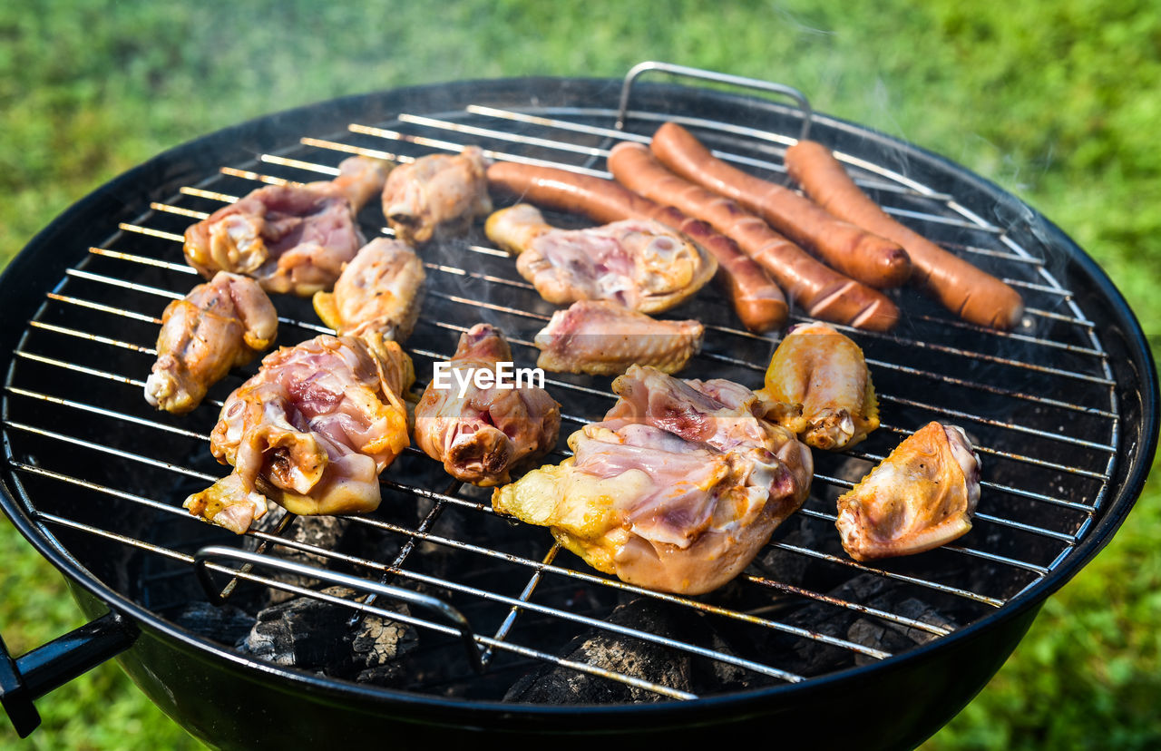 Close-up of meat on barbecue grill