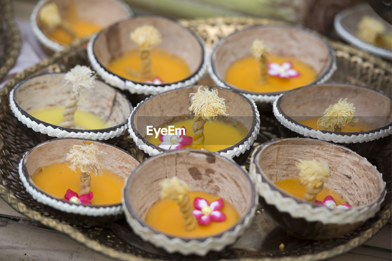 Close-up of diyas in plate