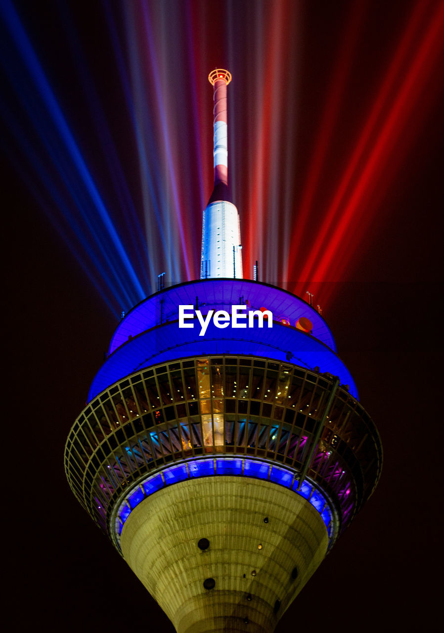 Low angle view of illuminated rheinturm