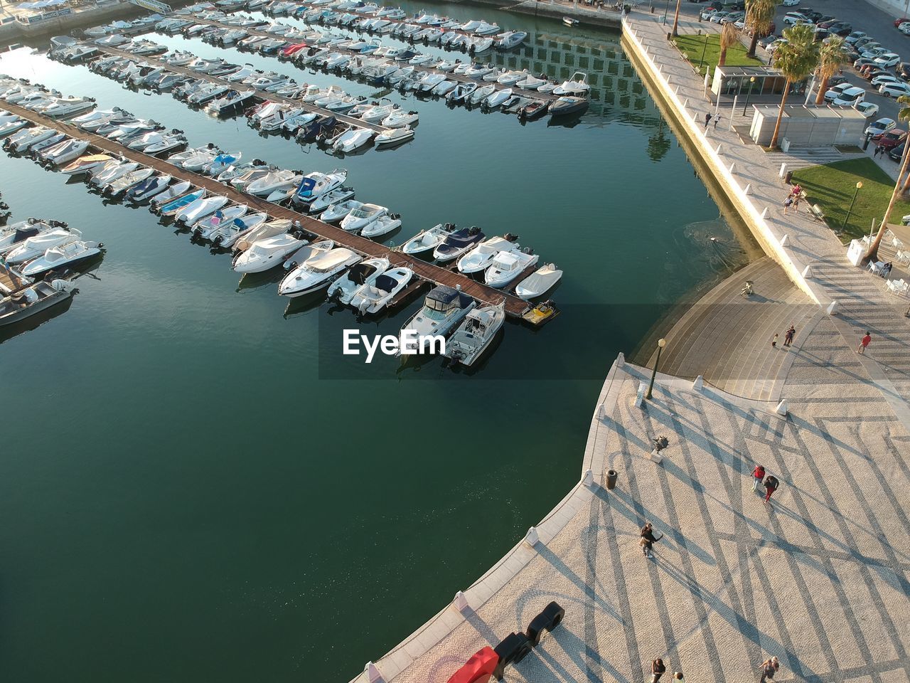 HIGH ANGLE VIEW OF PIER AT HARBOR